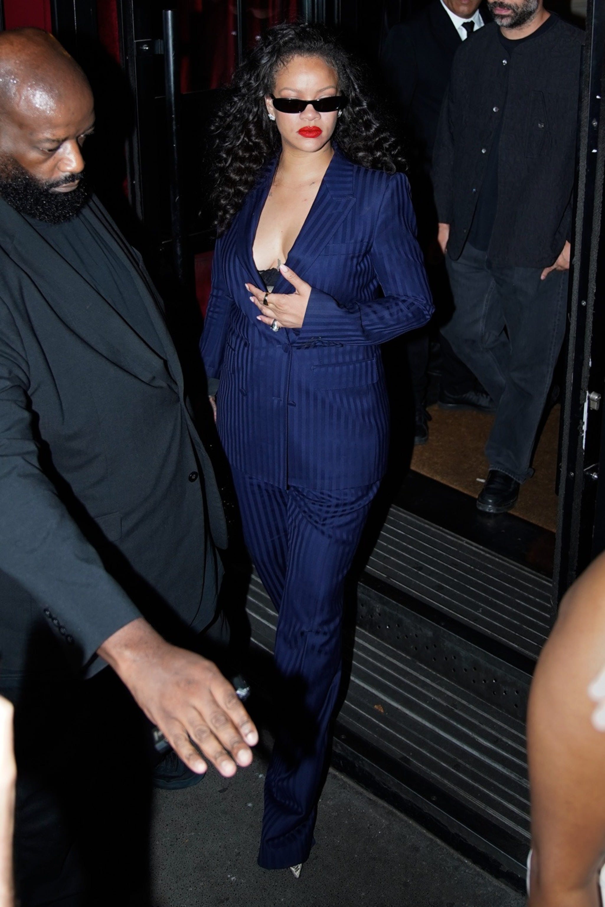 Rihanna Attends Céline Dion’s Paris Concert in a Midnight-Blue Tom Ford Suit and a Pop of Sequin Fringe
